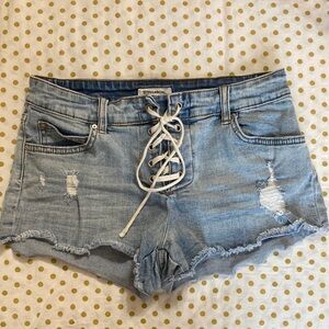 Billabong size 25 distressed blue jean denim shorts